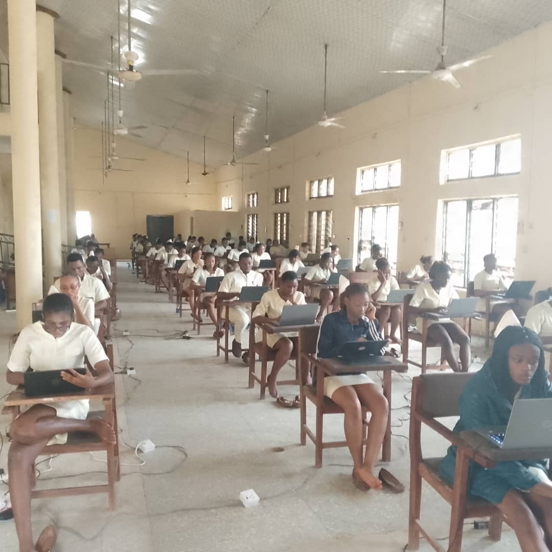 Large exam hall with students